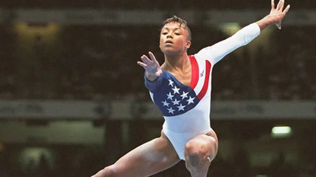 Dominique Dawes is a three-time Olympian; she is the first Black person to win an Olympic gold medal in gymnastics.