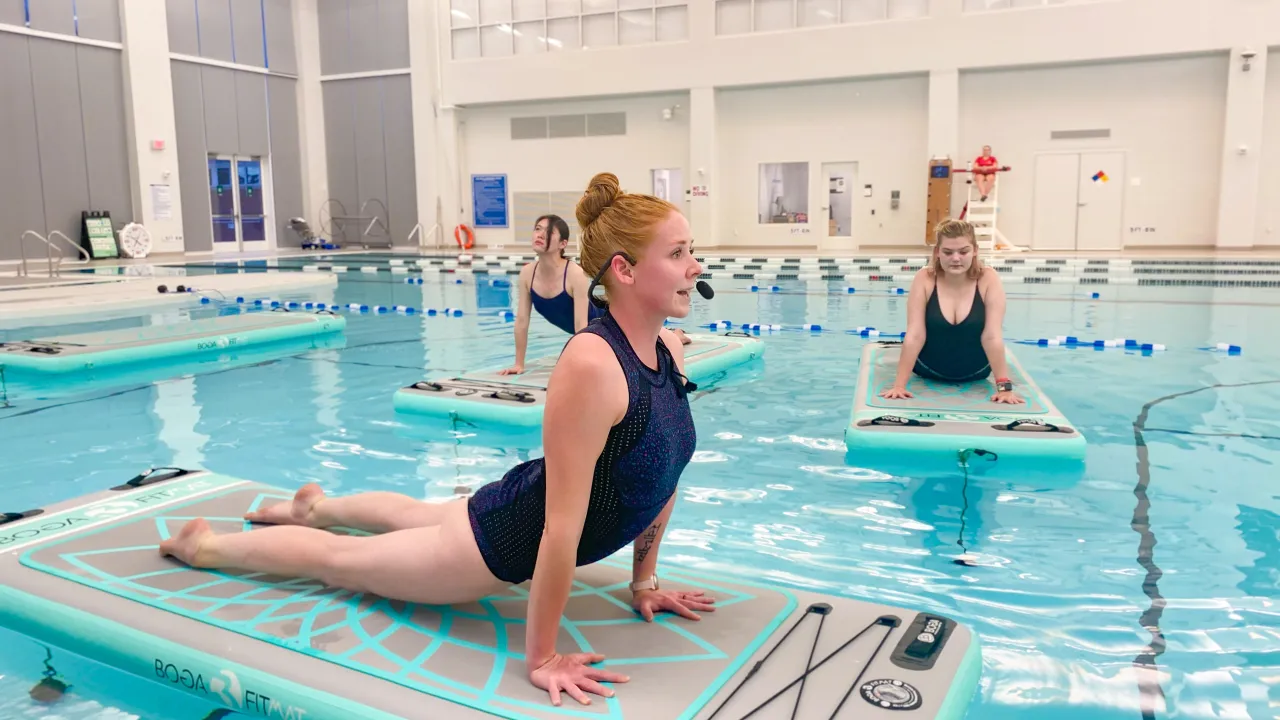 Out indoor pool features lap lanes, half basketball courts, a vortex, a volleyball net, and open swim.