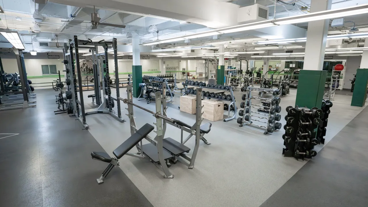 weight room with multiple weight options