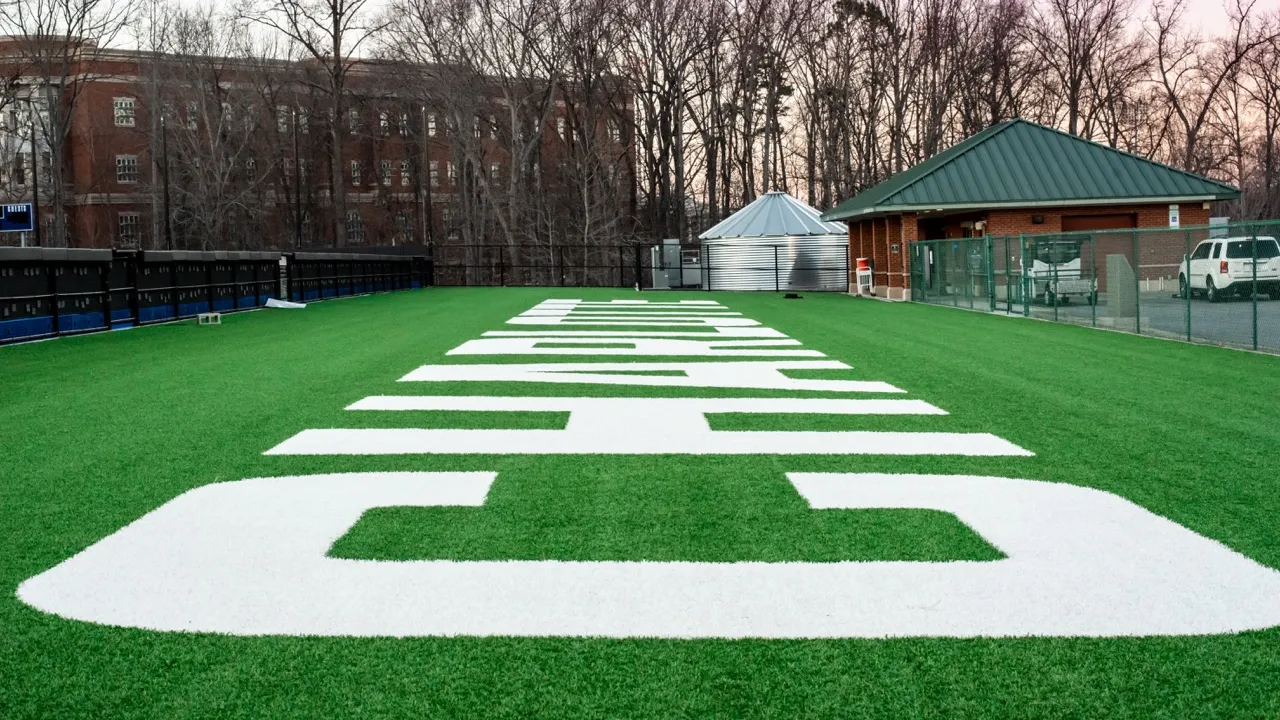 Charlotte written in turf field