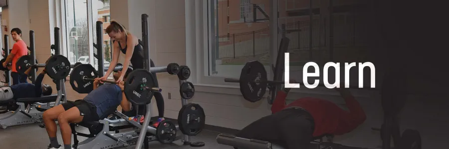 Assisting a lifter in the weightroom.